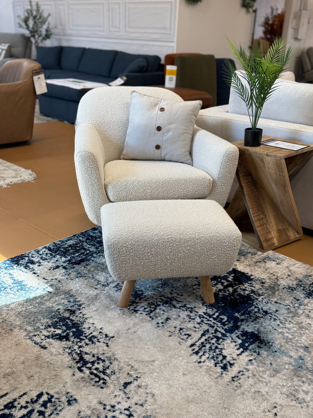 Ivory Bouclé Gabriola Lounge Chair with matching ottoman by Article, featuring plush fabric and modern design for comfortable seating.