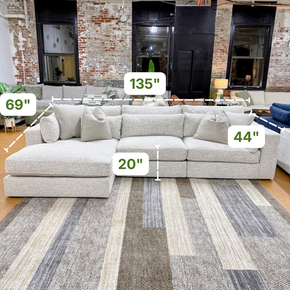 Ashley Furniture Alpine 3-piece sectional with chaise, featuring plush cushions and modern design for comfortable living spaces.