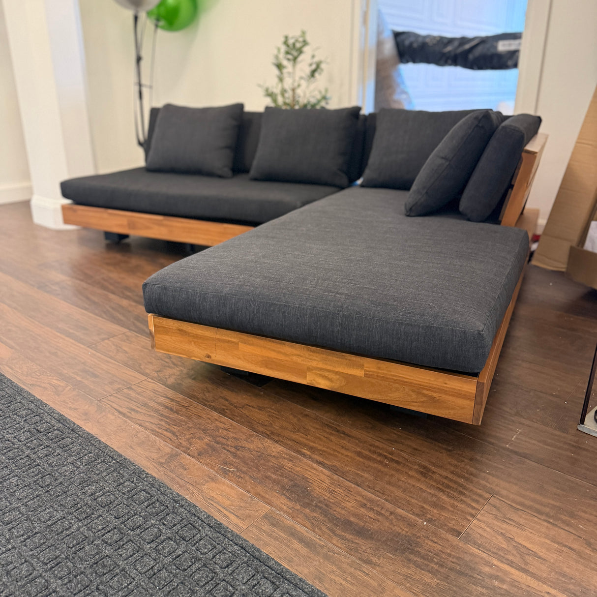 Right-facing outdoor sectional in slate gray with plush cushions, designed for comfortable outdoor seating by Article.