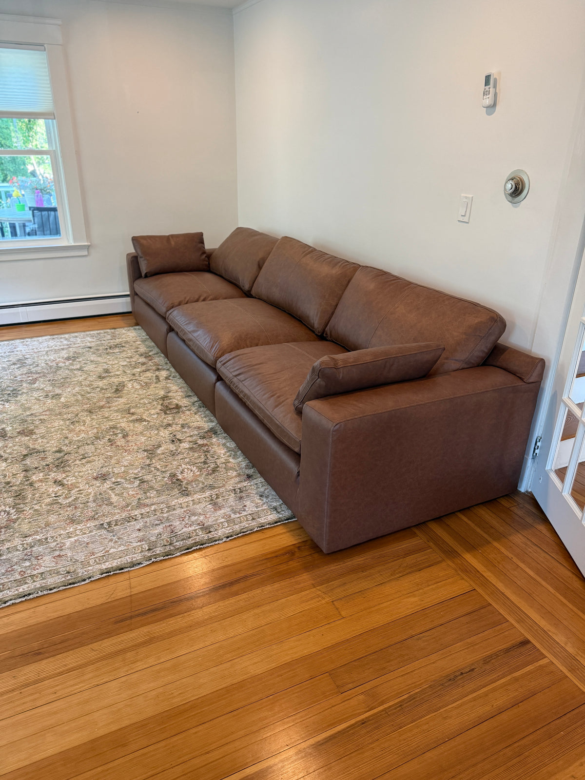Ashley Furniture Atlas Reserve Modular Sofa set with three sections, featuring plush cushions and modern design in a neutral fabric.