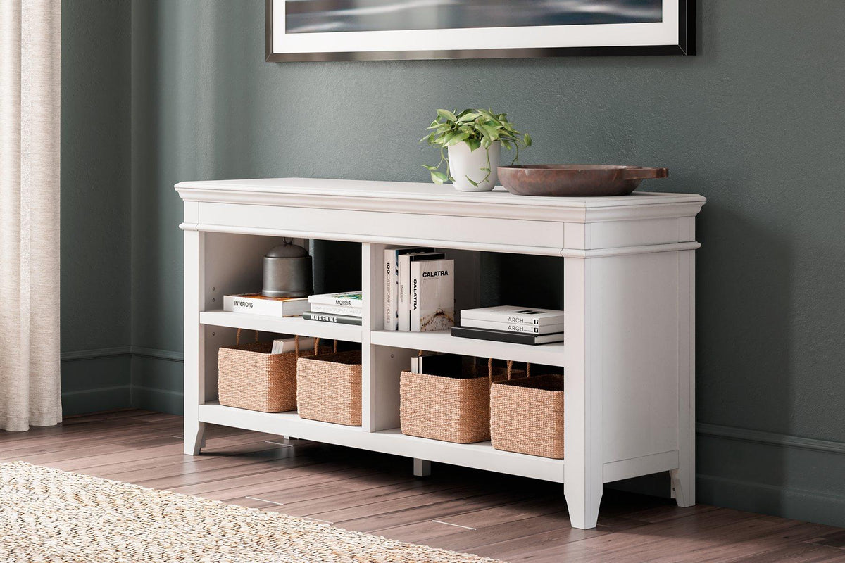 Ashley Furniture Kanwyn Credenza curio with glass doors and wooden shelves, showcasing storage and display space.