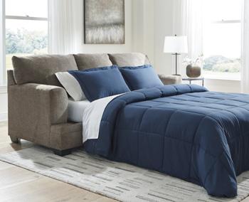 Ashley Furniture Stonemeade sleeper sofa with plush fabric and fold-out bed in a stylish living room setting.
