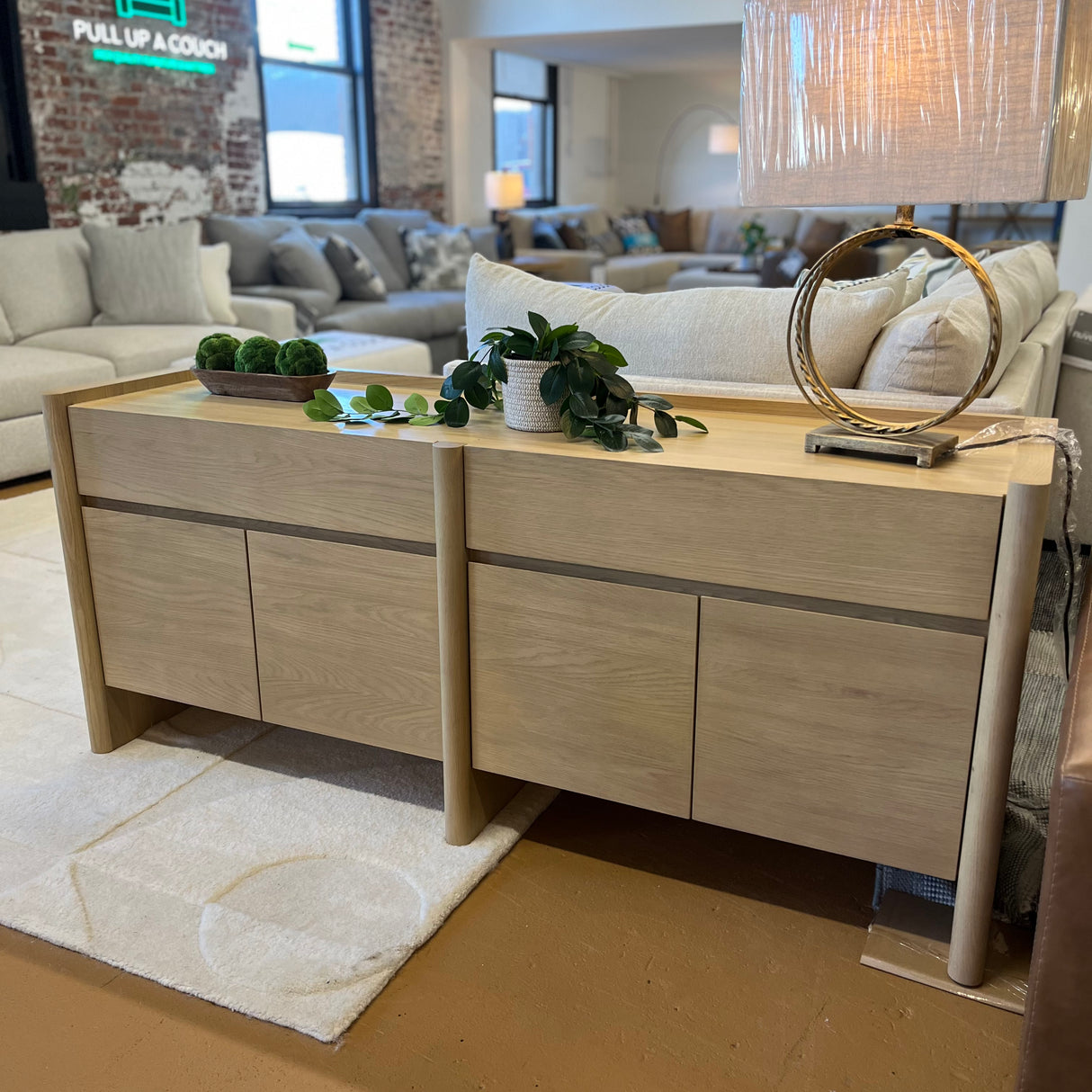 White oak 70-inch MCM-style sideboard by Article with sleek modern design and minimalist hardware.