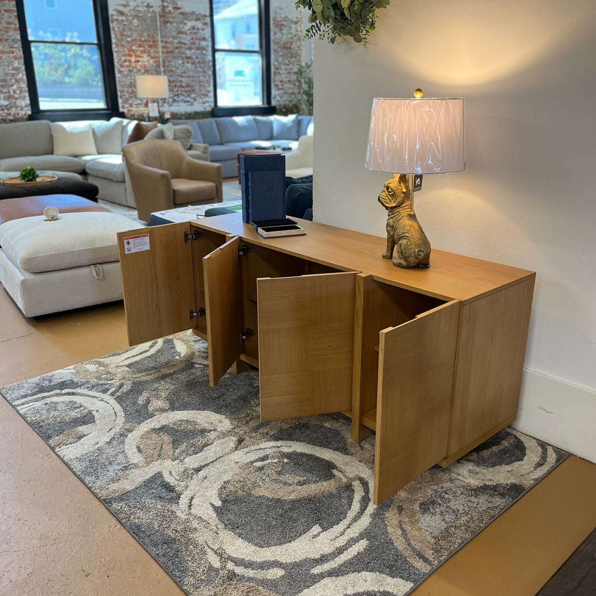 Natural oak MCM-style sideboard measuring 66 inches, designed by Article, with sleek modern storage and minimalist craftsmanship.