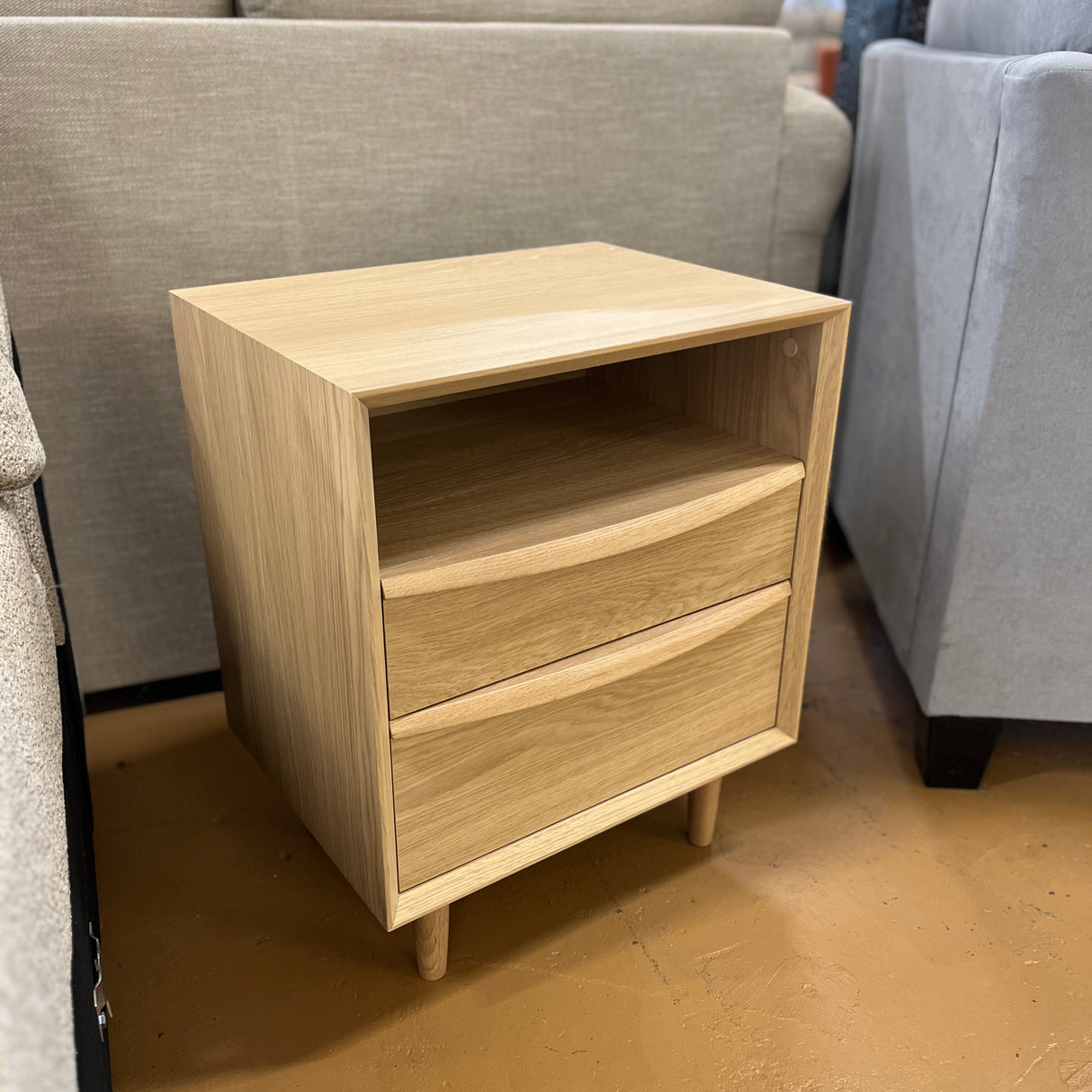 White oak MCM-style nightstand with two drawers, crafted by Article, featuring sleek mid-century modern design and clean lines.