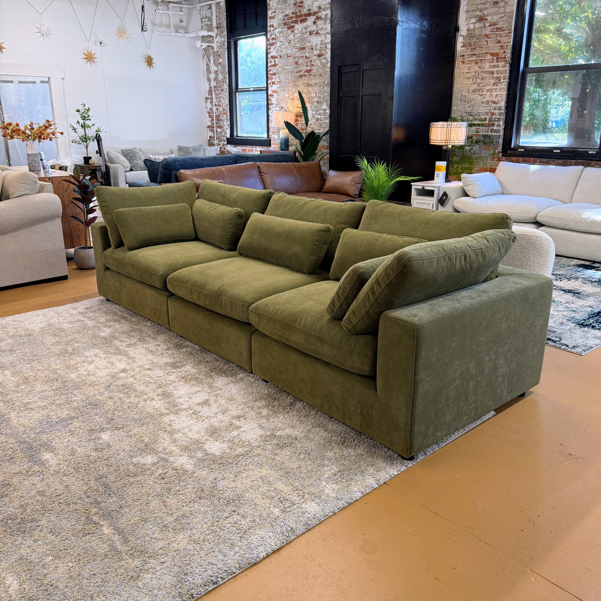Pull Up A Couch Serenity Cloud sectional sofa, a 3-piece sectional with plush cushions and modern design, shown in a cozy living room setting.