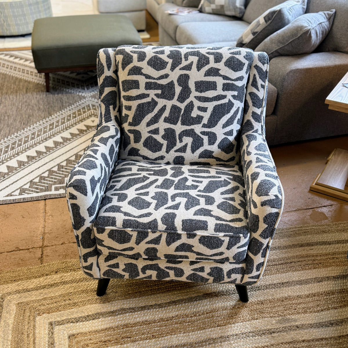 Fusion Barrington Accent Chair with plush fabric and wooden legs, stylishly designed for modern living rooms.