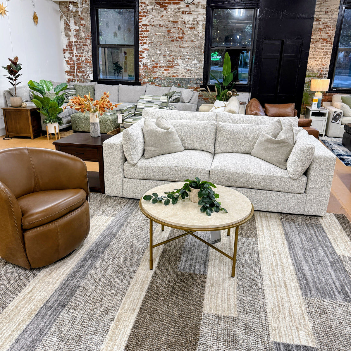 Alpine 2-piece sectional sofa by Ashley Furniture with plush cushions and neutral fabric, designed for modern living rooms.