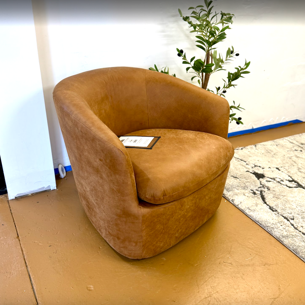 32.5" Rawhide Leather Swivel Chair (Tan) - Pull Up A Couch