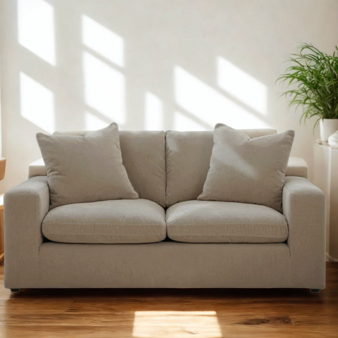 Ashley Furniture Nova Cloud Loveseat with plush cushions and modern design, shown in a cozy living room setting.
