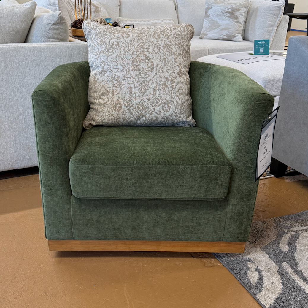Ashley Furniture Jersonlow Swivel Chair with cushioned seat and back, featuring a modern design and a sturdy swivel base.