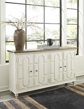 Ashley Furniture Roranville accent cabinet with wood finish and decorative hardware, ideal for living room or entryway decor.