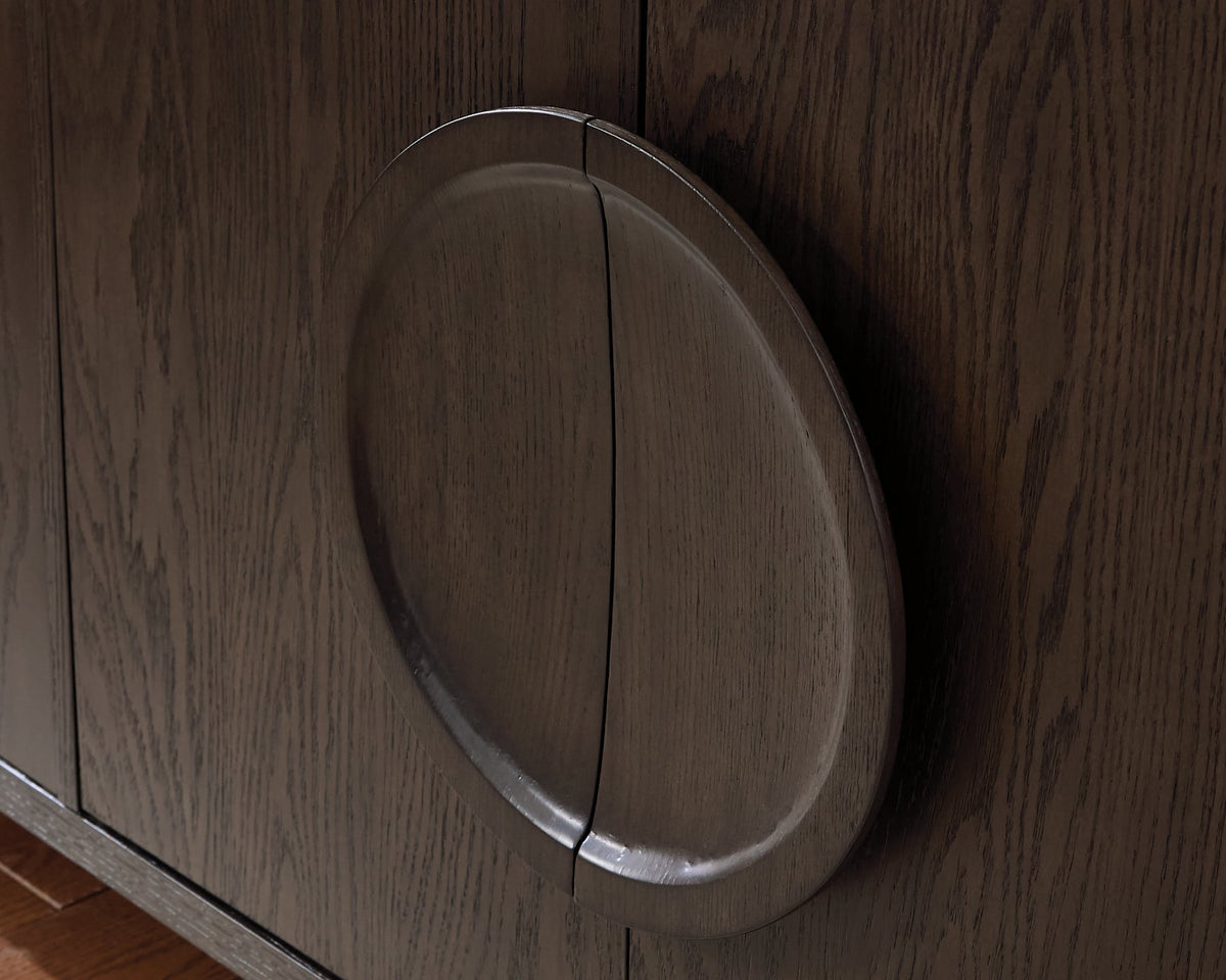 Ashley Furniture Veeda Accent Cabinet with sleek handle details, showcasing modern design and storage features.
