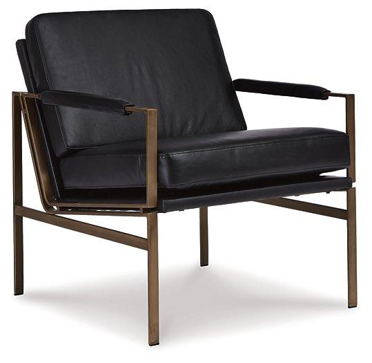 Ashley Furniture Puckman Accent Chair with plush fabric upholstery and modern design, perfect for living room decor.