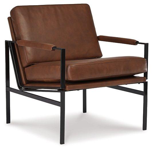 Ashley Furniture Puckman Accent Chair with plush fabric and modern design, showcasing its stylish and comfortable seating.
