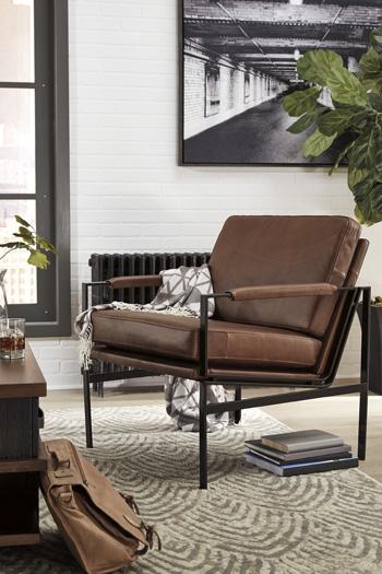 Ashley Furniture Puckman Accent Chair with plush fabric and modern design, perfect for living room or bedroom decor.