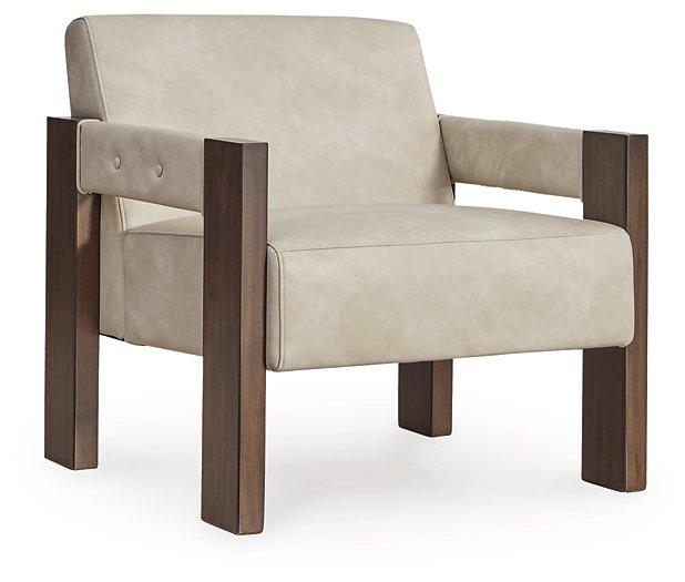 Ashley Furniture Adlanlock accent chair with plush upholstery and wooden legs, stylishly designed for living room decor.