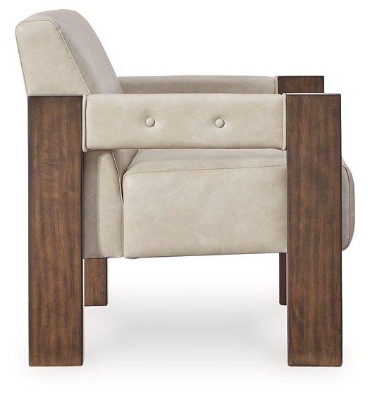 Ashley Furniture Adlanlock accent chair with wooden legs and plush fabric, showcasing its stylish design and comfortable seating.
