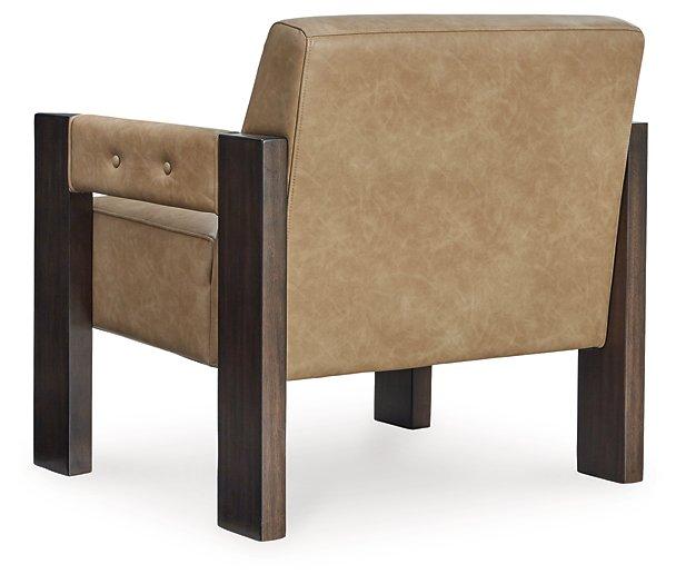 Ashley Furniture Adlanlock accent chair with plush upholstery and wooden legs, showcasing a stylish and comfortable seating option.