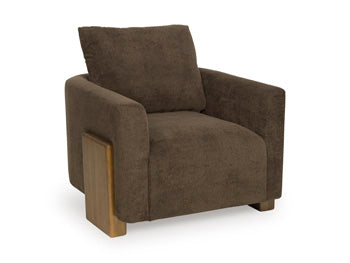 Ashley Furniture Dairlett Accent Chair with plush fabric and modern design, shown from an angled view.