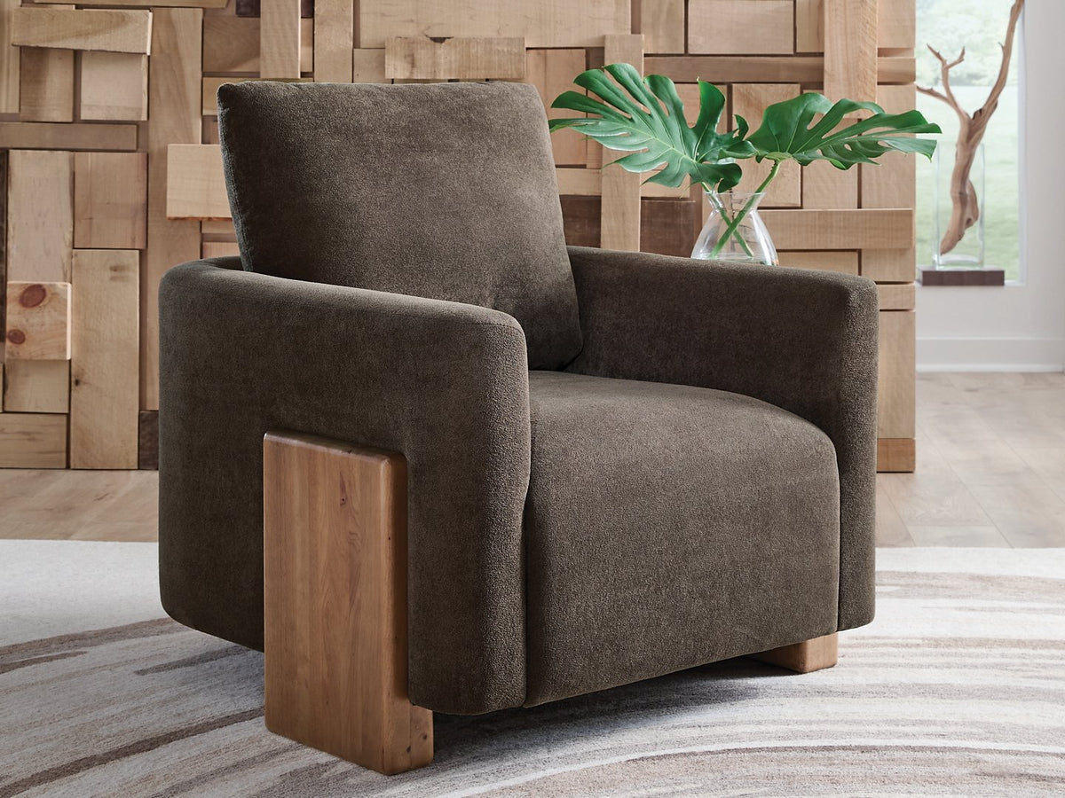 Ashley Furniture Dairlett accent chair with plush upholstered seat and wooden legs, perfect for stylish living room decor.