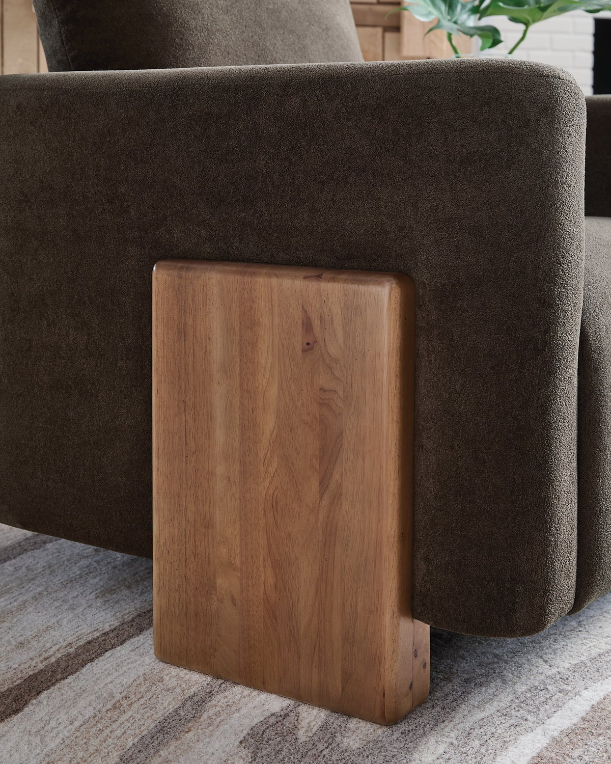 Ashley Furniture Dairlett Accent Chair with plush fabric upholstery and tapered wooden legs, stylish and comfortable for living rooms.