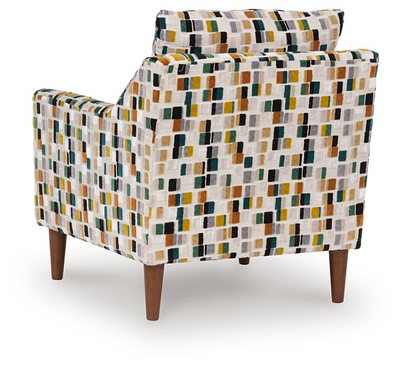 Ashley Furniture Fenna Accent Chair with plush fabric, curved backrest, and wooden legs, designed for stylish living room seating.