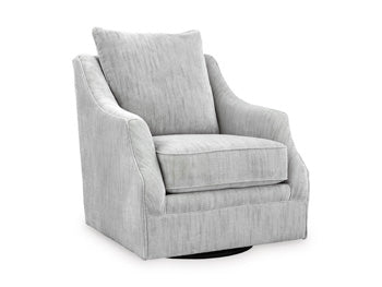 Ashley Furniture Gubbins swivel accent chair with a rounded back and plush cushion, shown from an angled side view.