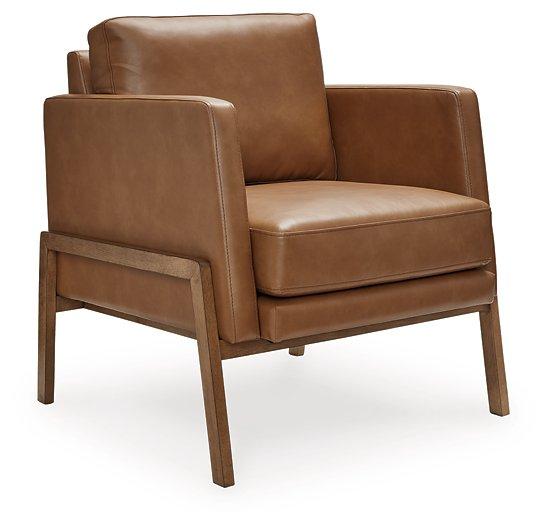 Ashley Furniture Numund accent chair with plush fabric and modern design, showcasing its comfortable, stylish seating.