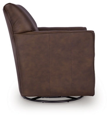 Ashley Furniture Braydunn swivel glider accent chair with plush upholstery and modern design, shown from the side in a cozy living room setting.