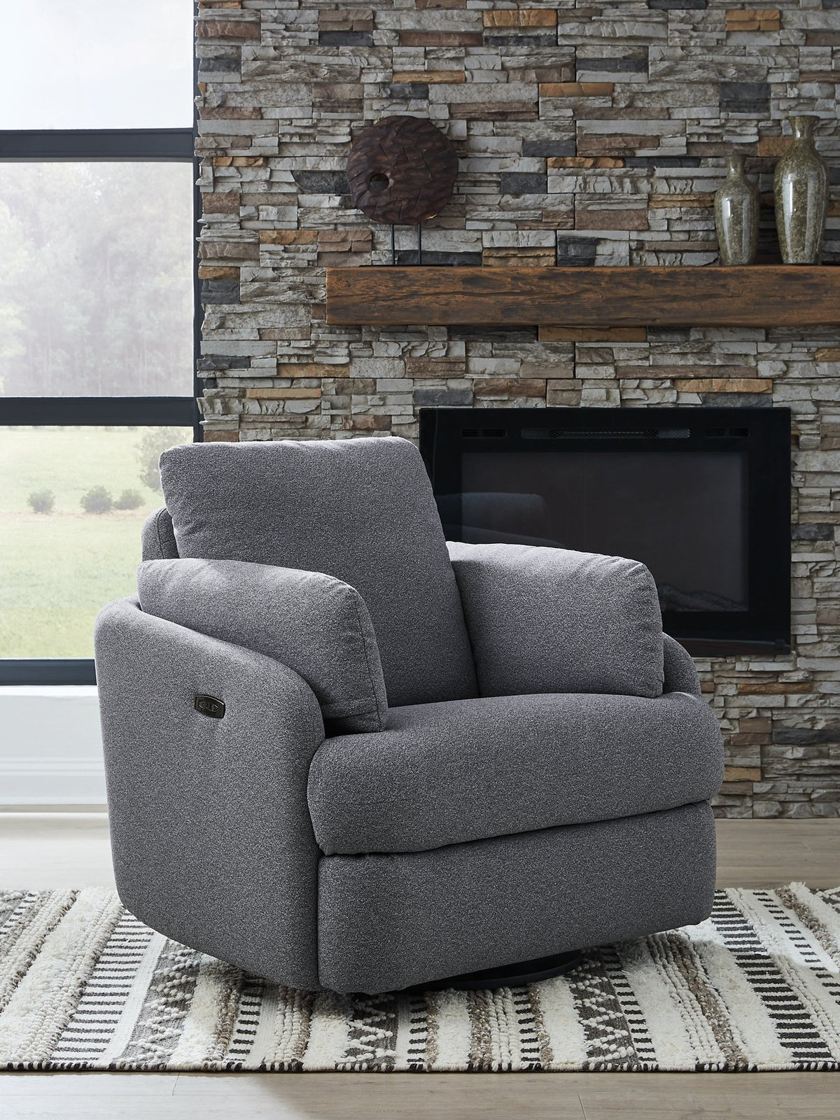 Ashley Furniture Alainmont Next-Gen Nuvella swivel accent chair with plush cushioning and modern design.