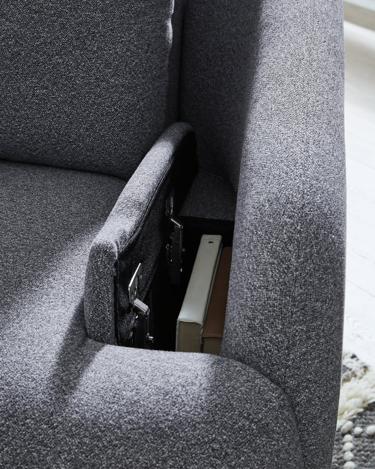 Ashley Furniture Alainmont Next-Gen Nuvella swivel power recliner accent chair with plush fabric and modern design.