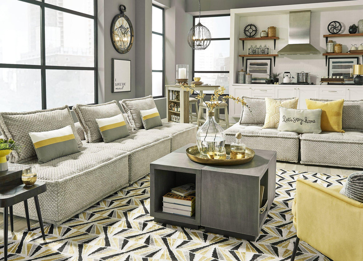 Ashley Furniture Bales accent chair with plush fabric upholstery and modern design, shown in a cozy living room setting.