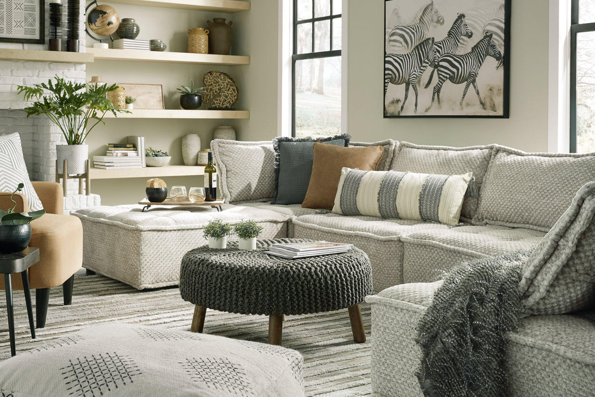 Ashley Furniture Bales accent chair with beige fabric upholstery and wooden legs, stylish and comfortable seating for living rooms.