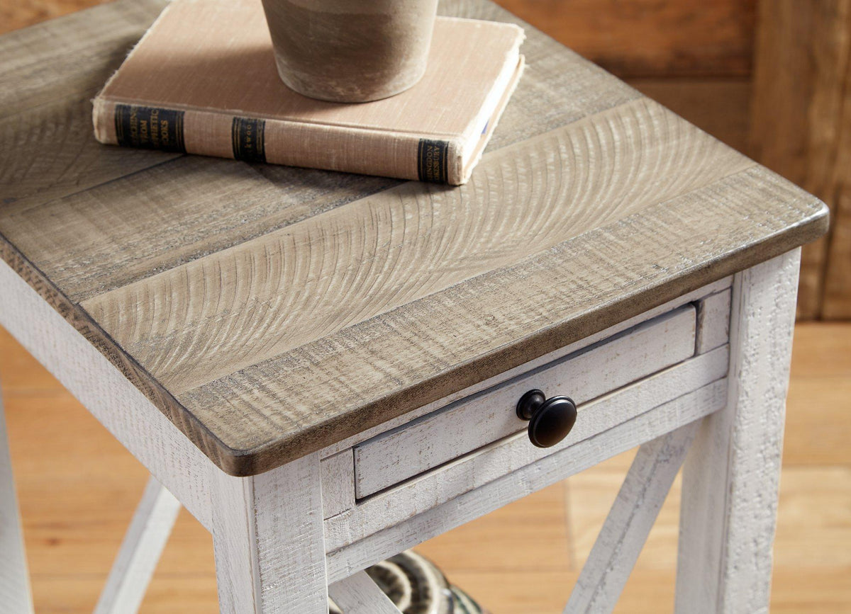 Ashley Furniture Adalane accent table with a round wooden top and black metal legs, ideal for living room or bedroom decor.