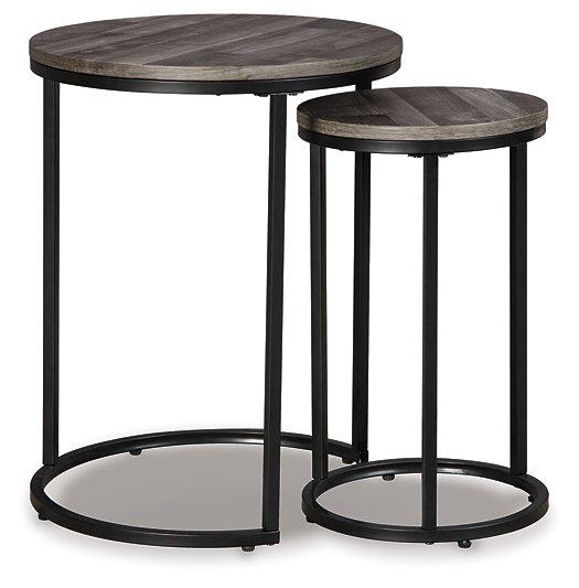 Set of two Ashley Furniture Briarsboro accent tables with wooden tops and black metal legs, perfect for living room decor.