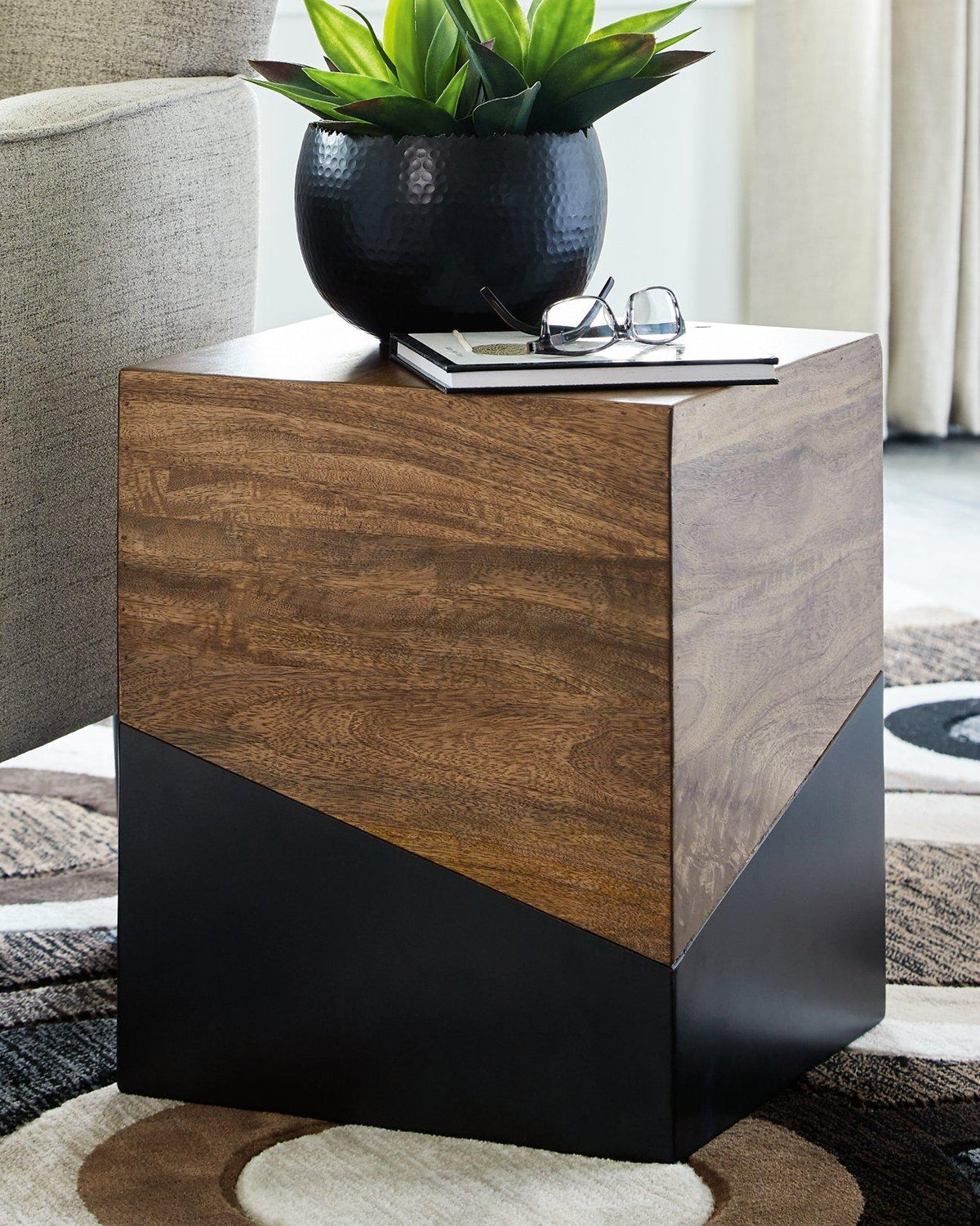 Ashley Furniture Trailbend Accent Table showing a wooden surface with a sleek, modern design suitable for living room decor.