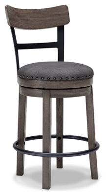 Ashley Furniture Caitbrook counter height bar stool with wooden legs and cushioned seat, shown from an angled view.