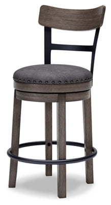 Ashley Furniture Caitbrook counter height bar stool with wooden legs and upholstered seat, shown from an angled side view.