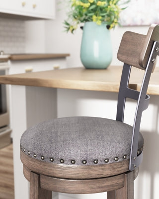 Ashley Furniture Caitbrook counter height bar stool with wooden legs and cushioned seat, detailed close-up image.