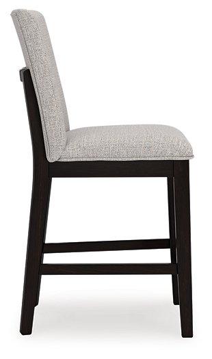 Ashley Furniture Neymorton counter height barstool with wooden legs and upholstered seat, ideal for kitchen or bar area.