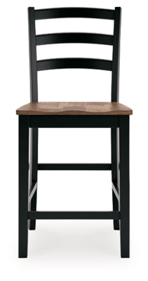 Wildenauer Ashley Furniture counter height barstool with wooden legs and cushioned seat, shown from a front head-on view.
