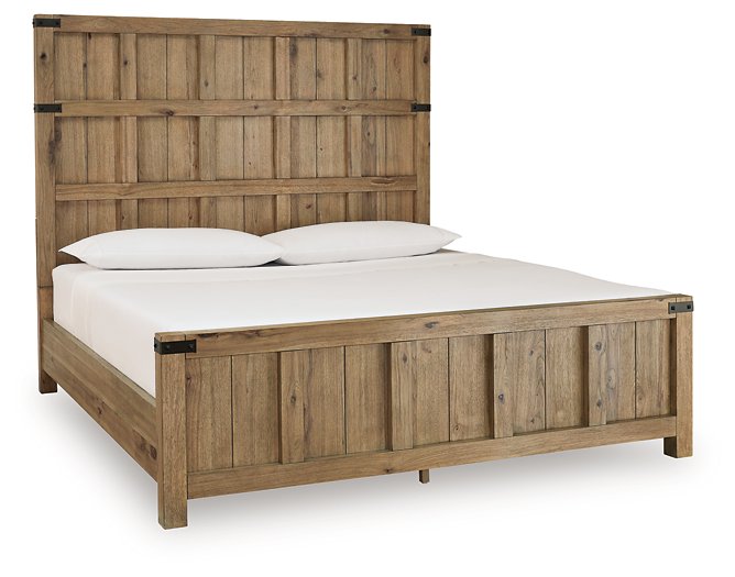 Ashley Furniture Ridgester Bed with a wood frame and detailed headboard, shown from an angled side view.