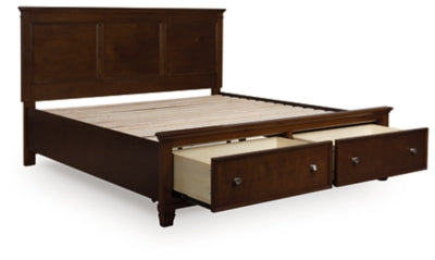 Open view of Ashley Furniture Danabrin Panel Storage Bed showcasing the wood panel design and storage drawers in a bedroom setting.