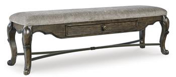 Maylee 63-inch wooden dining bench by Ashley Furniture with a comfortable, modern design and natural wood finish.
