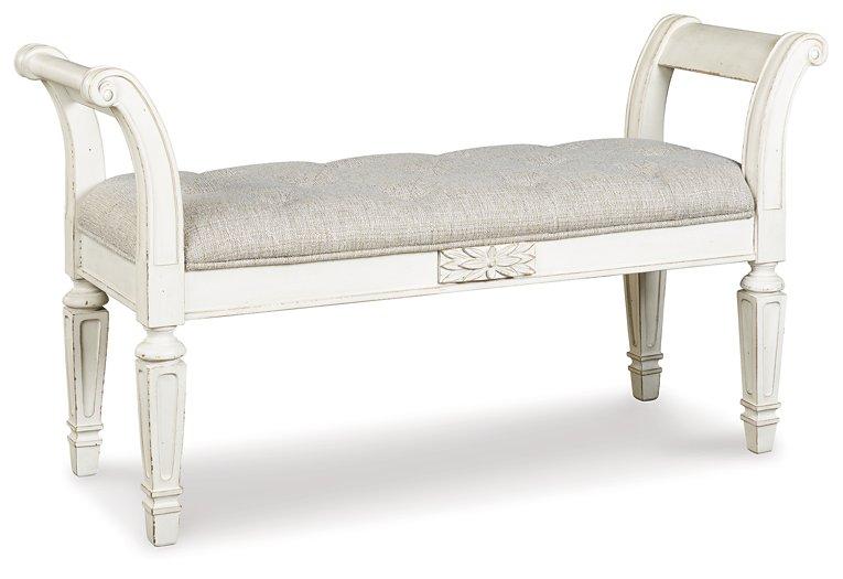 Ashley Furniture Realyn Accent Bench with cushioned seat and wooden legs, ideal for entryways or living rooms.