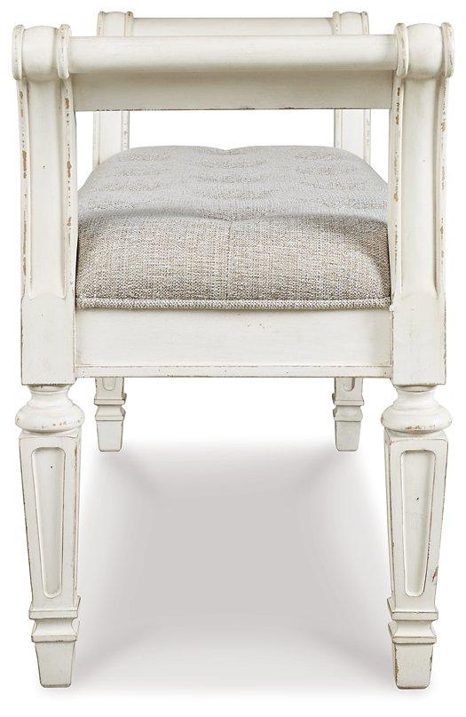 Ashley Furniture Realyn Accent Bench with wooden legs and upholstered seat, ideal for entryways or living rooms.