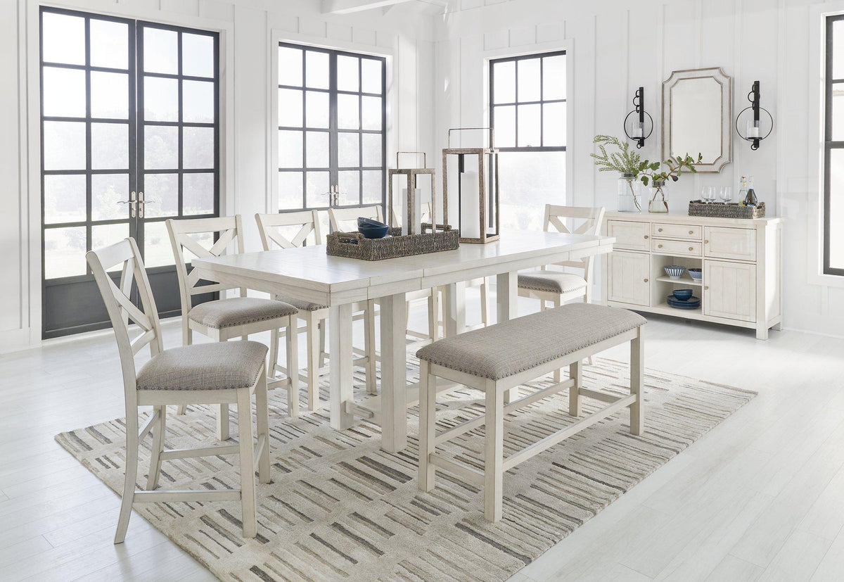 Ashley Furniture Robbinsdale 49-inch counter height dining bench with wooden legs and upholstered seat for comfortable dining seating.