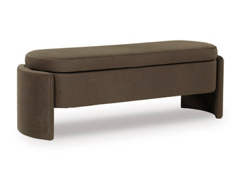 Ashley Furniture Vavuniya Storage Bench with wooden finish and cushioned top, ideal for entryways or living rooms.