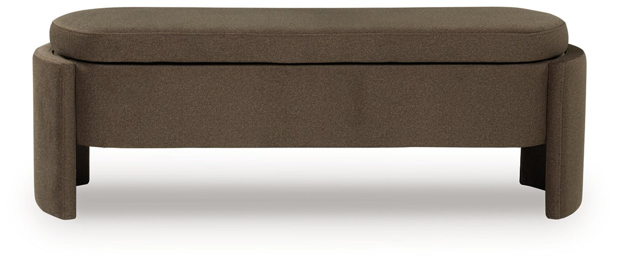 Ashley Furniture Vavuniya storage bench with cushioned top and wooden base, ideal for living room or entryway seating.